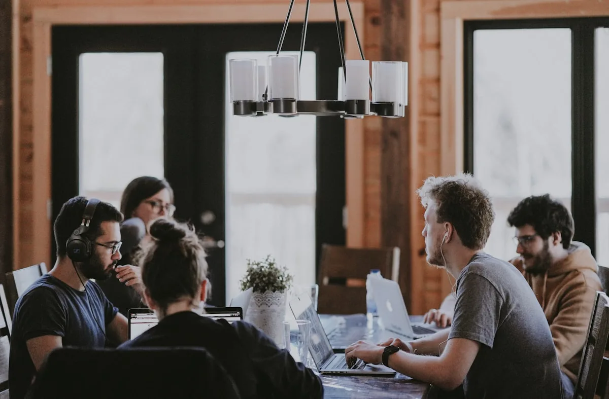 A team working together around a meeting table